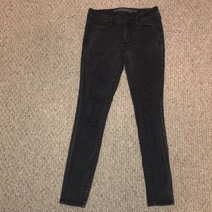 Black American Eagle distressed skinny jeans